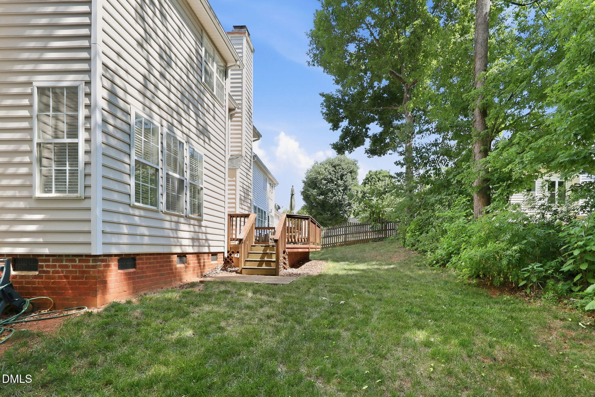 9105 Willow Valley Court Raleigh, NC 27617 - Photo 38 of 51 a view of a backyard with a garden and plants