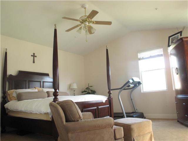 16751 Open View Road Ramona, CA 92065 - Photo 11 of 19 Master bdrm has "his and hers" walk in closets located in the Master Bathroom. Master Bdrm has glass doors access to back patio. Very light and bright