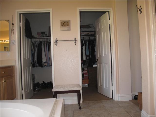 16751 Open View Road Ramona, CA 92065 - Photo 13 of 19 His/hers walk in closets located in master bath/spa