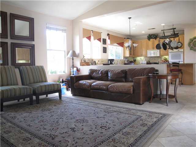 16751 Open View Road Ramona, CA 92065 - Photo 5 of 19 The Dining room leadrs to the right into the Kitchen and Family room open area, ideal for entertaining