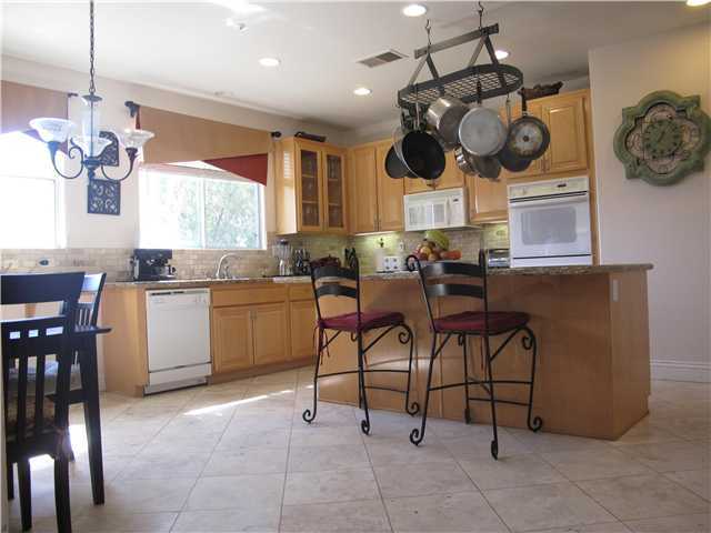 16751 Open View Road Ramona, CA 92065 - Photo 8 of 19 Equisite Kitchen with custom cabinetry and granite counters