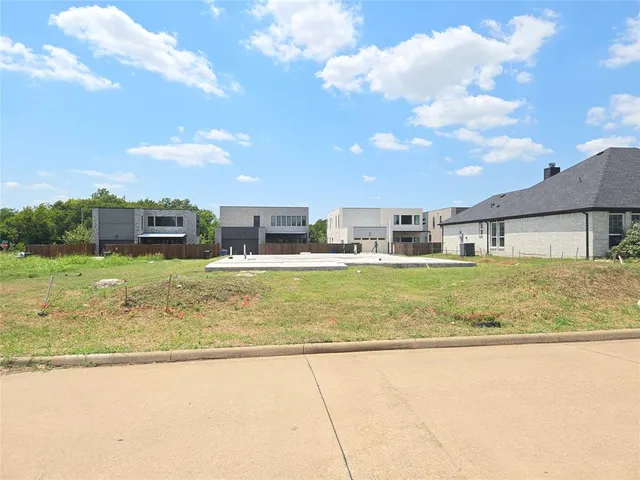 a view of an swimming pool with a yard