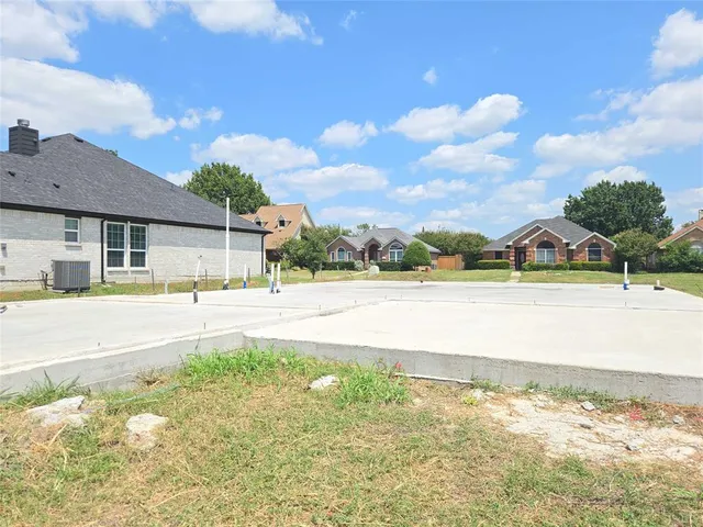 a view of a house with a ocean view