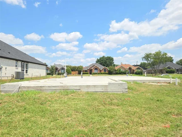a view of an swimming pool and a yard