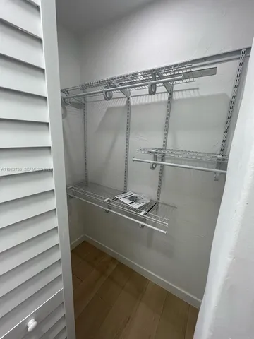 a view of a room with racks on the wall