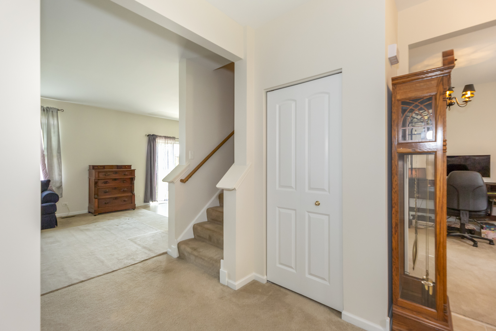 412 Preserve Drive Genoa, IL 60135 - Photo 22 of 39 a view of a livingroom with furniture and staircase