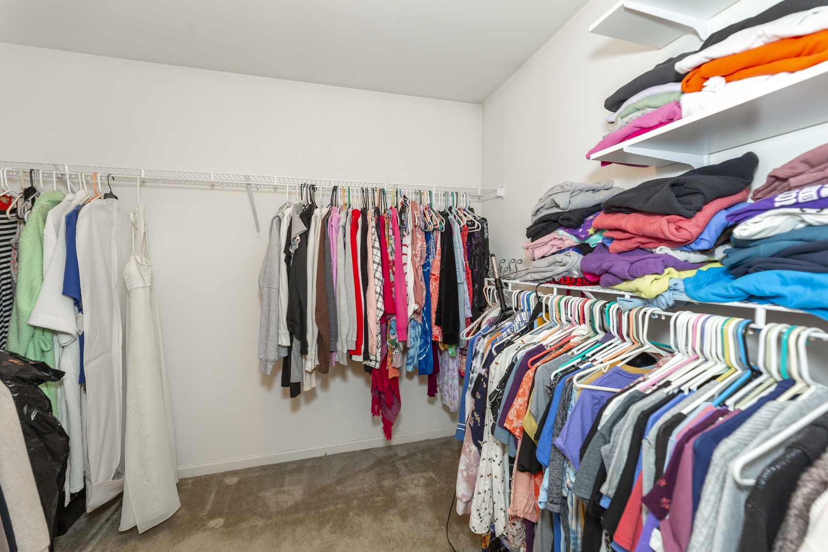 412 Preserve Drive Genoa, IL 60135 - Photo 28 of 39 a view of walk in closet with clothes
