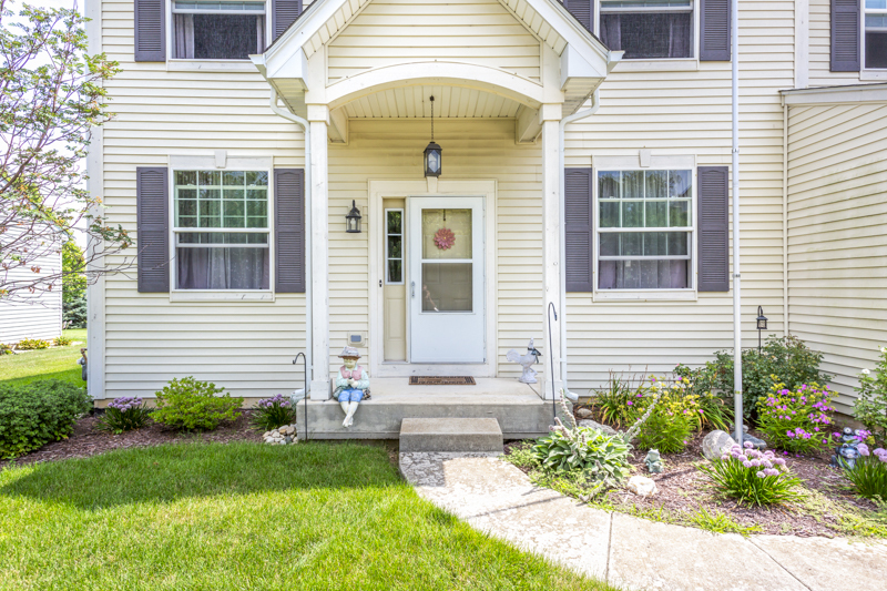412 Preserve Drive Genoa, IL 60135 - Photo 3 of 39 a front view of a house with garden