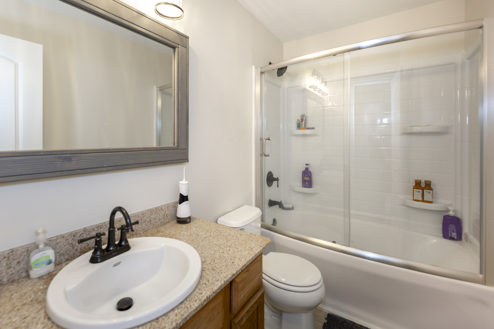 412 Preserve Drive Genoa, IL 60135 - Photo 32 of 39 a bathroom with a sink a toilet and shower