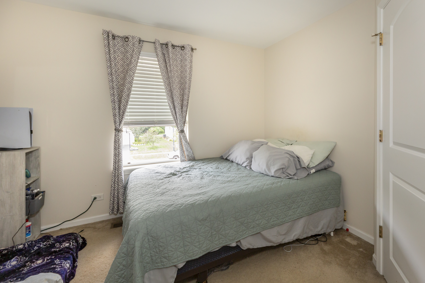 412 Preserve Drive Genoa, IL 60135 - Photo 34 of 39 a bedroom with a bed and a window