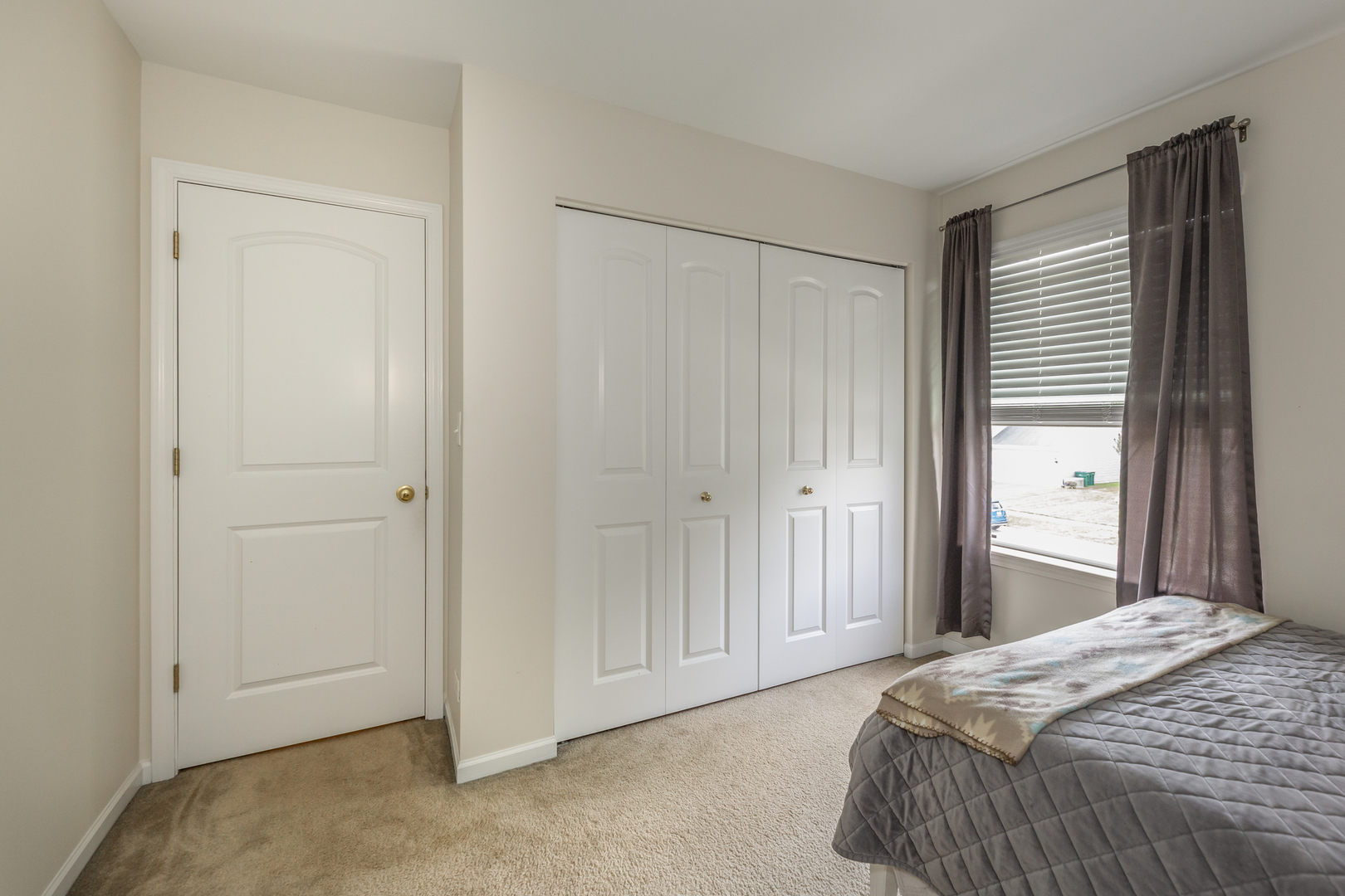 412 Preserve Drive Genoa, IL 60135 - Photo 35 of 39 a bedroom with a bed and a mirror