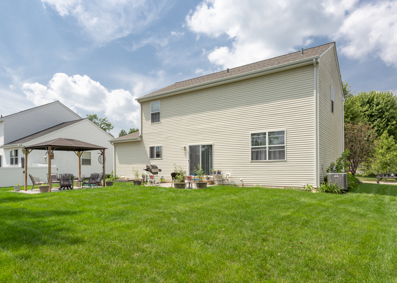 412 Preserve Drive Genoa, IL 60135 - Photo 8 of 39 a front view of house with yard