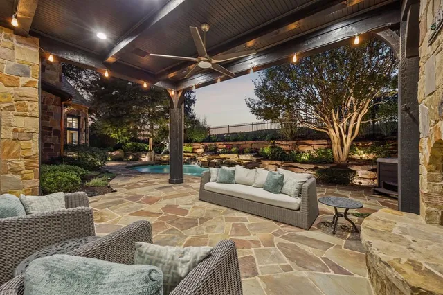 a view of swimming pool with a yard