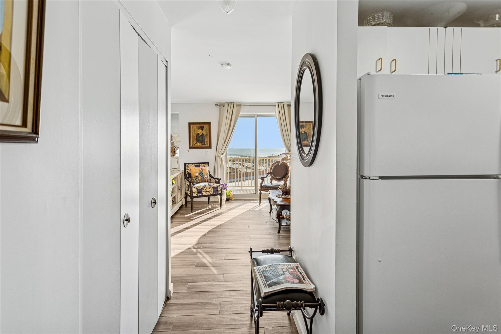 2 Richmond Road, Unit 3B Lido Beach, NY 11561 - Photo 8 of 17 a view of living room with furniture a rug and white walls