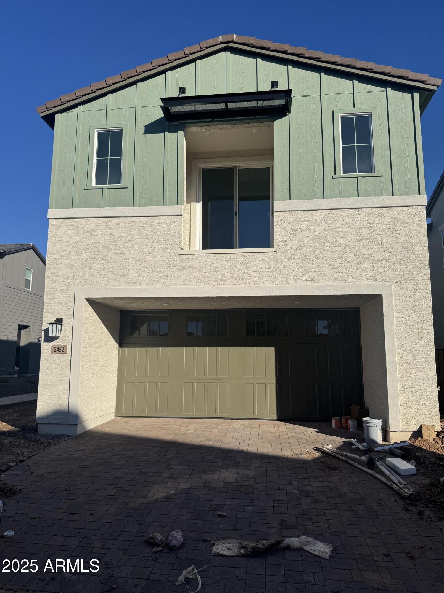 a kitchen with a sink and a microwave