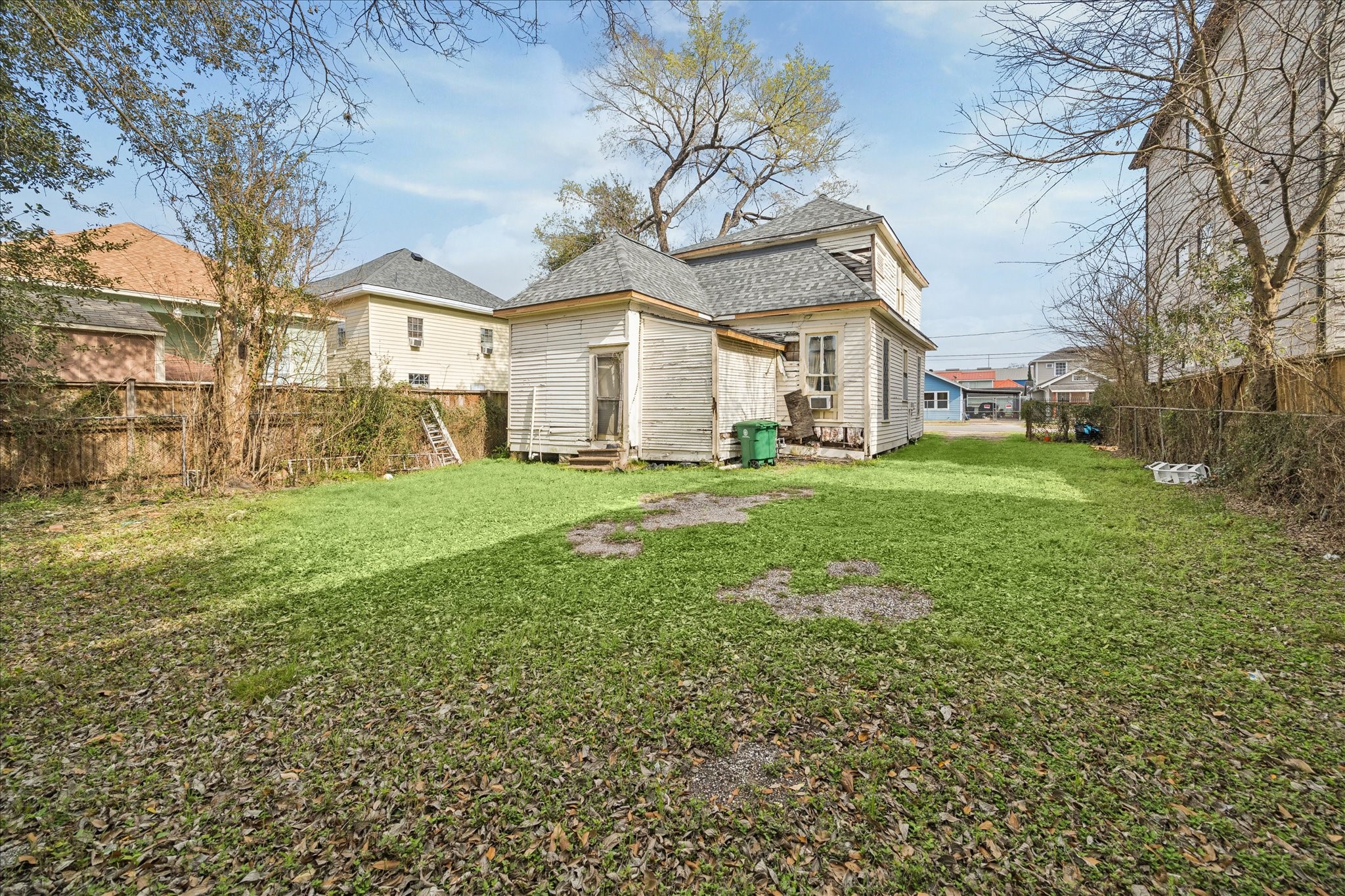 304 Palmer Street Houston, TX 77003 - Photo 6 of 7 a front view of a house with a yard