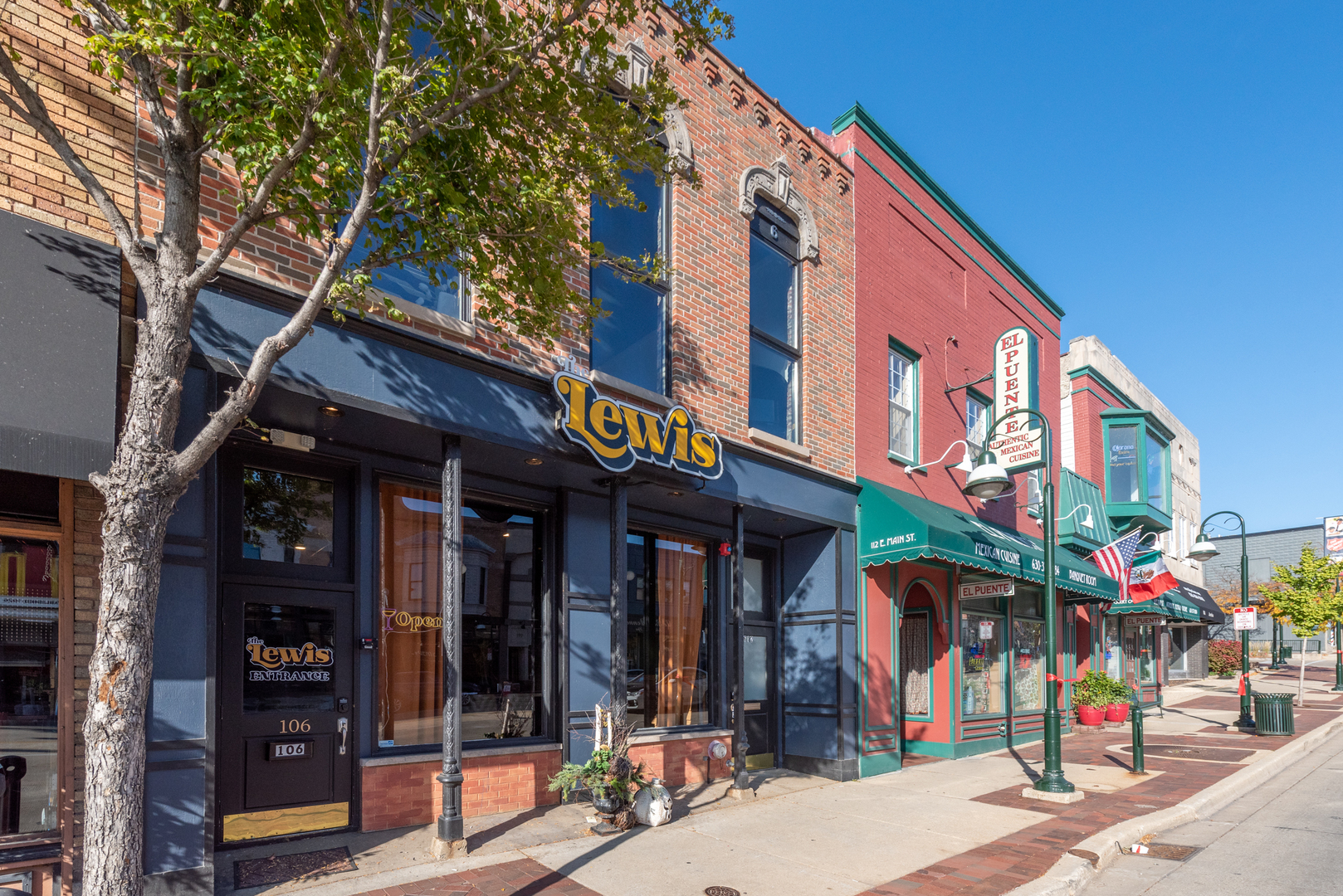 106 East Main Street St. Charles, IL 60174 - Photo 1 of 46 a view of a building with retail shops