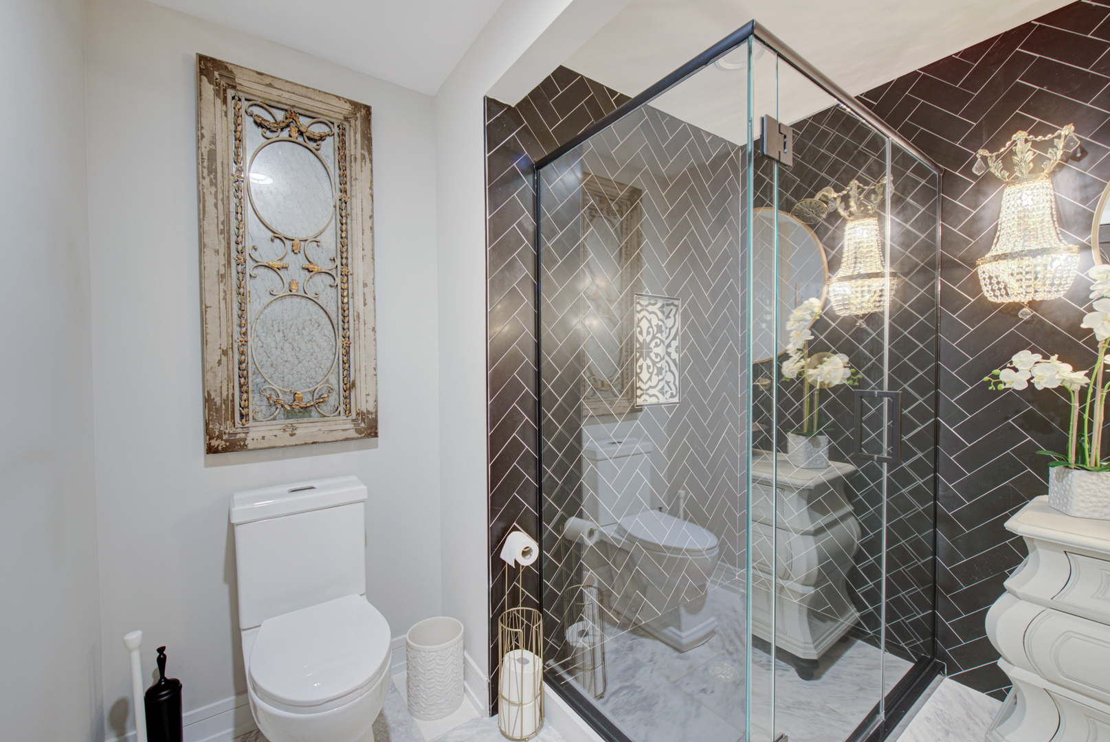 106 East Main Street St. Charles, IL 60174 - Photo 13 of 46 a bathroom with a toilet sink and shower