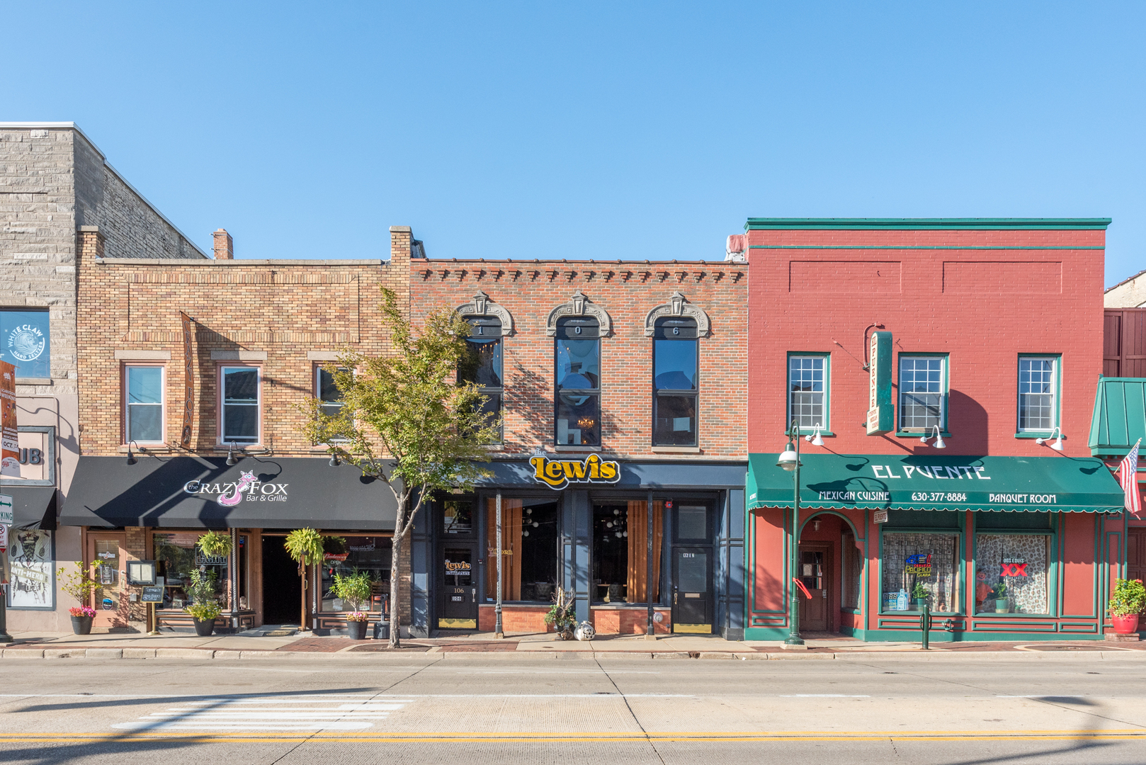 106 East Main Street St. Charles, IL 60174 - Photo 2 of 46 a view of a building with a outdoor space