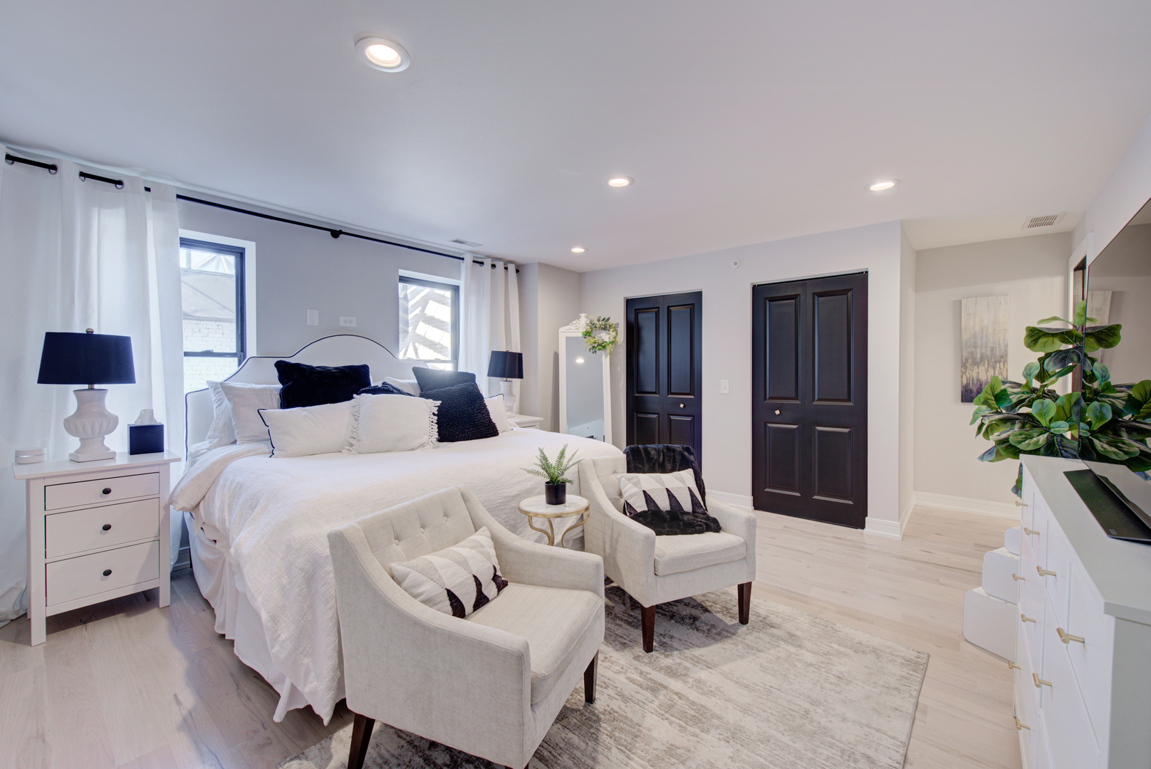 106 East Main Street St. Charles, IL 60174 - Photo 25 of 46 a bedroom with a bed and a couch