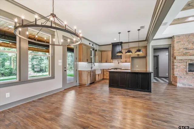a view of a kitchen with a sink cabinet and a living room