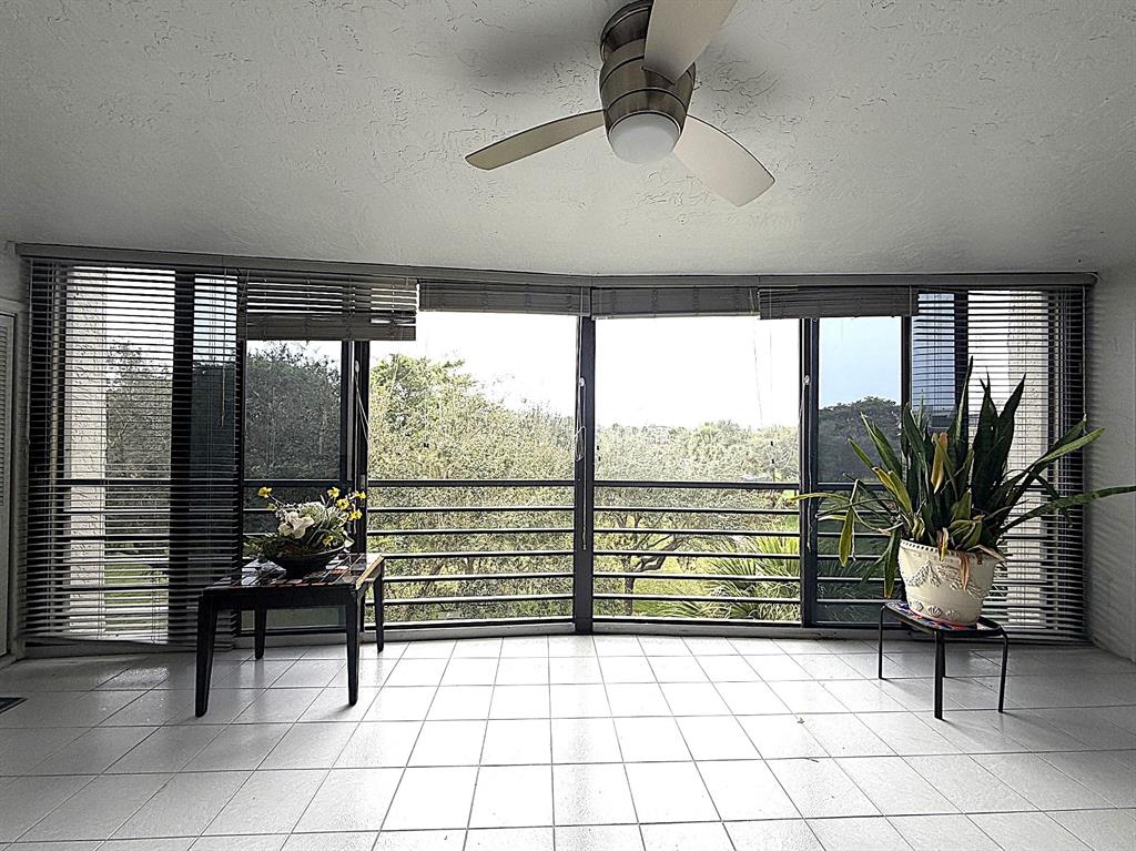 9170 Southwest 14th Street, Unit 4409 Boca Raton, FL 33428 - Photo 24 of 26 workspace with furniture and window