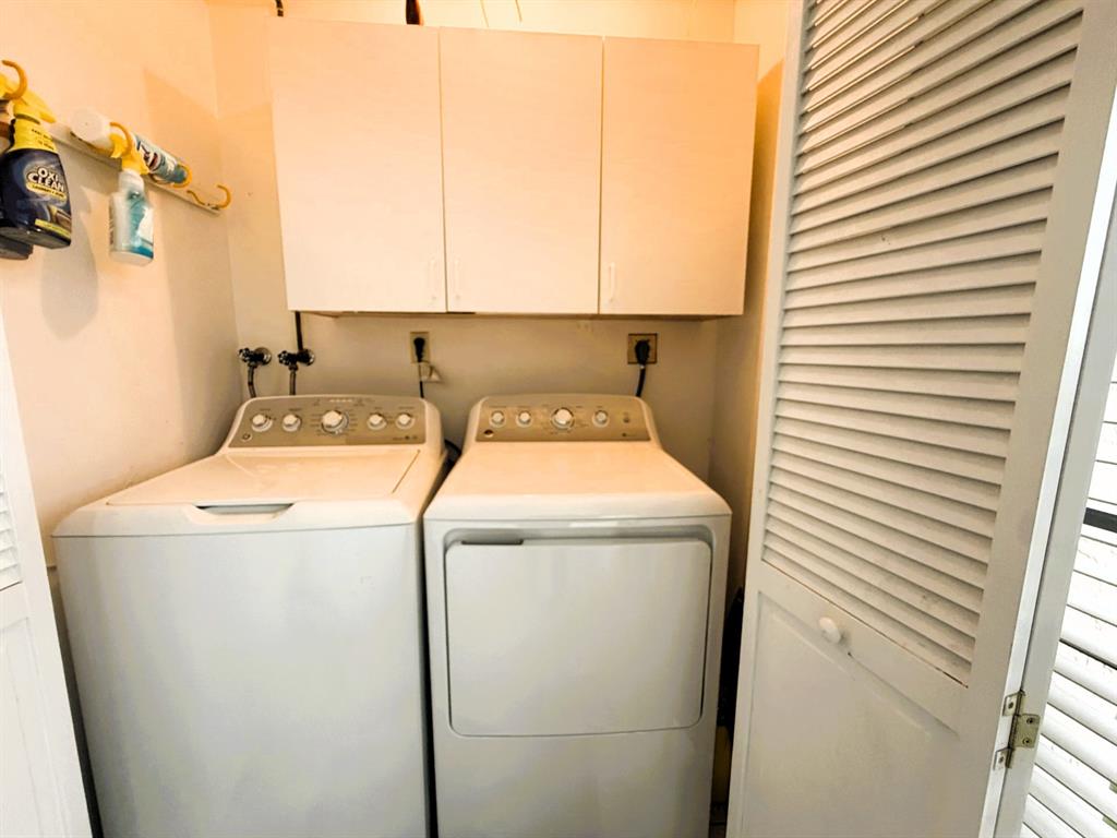 9170 Southwest 14th Street, Unit 4409 Boca Raton, FL 33428 - Photo 25 of 26 a utility room with dryer and washer