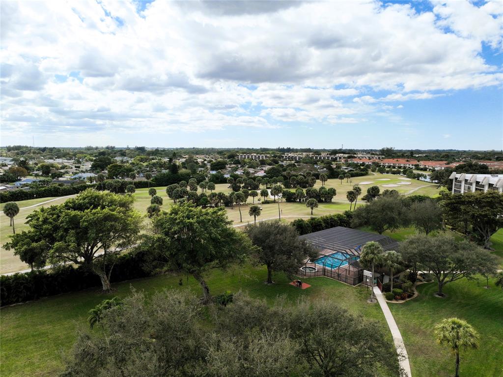 9170 Southwest 14th Street, Unit 4409 Boca Raton, FL 33428 - Photo 26 of 26 a view of a lake with houses in back
