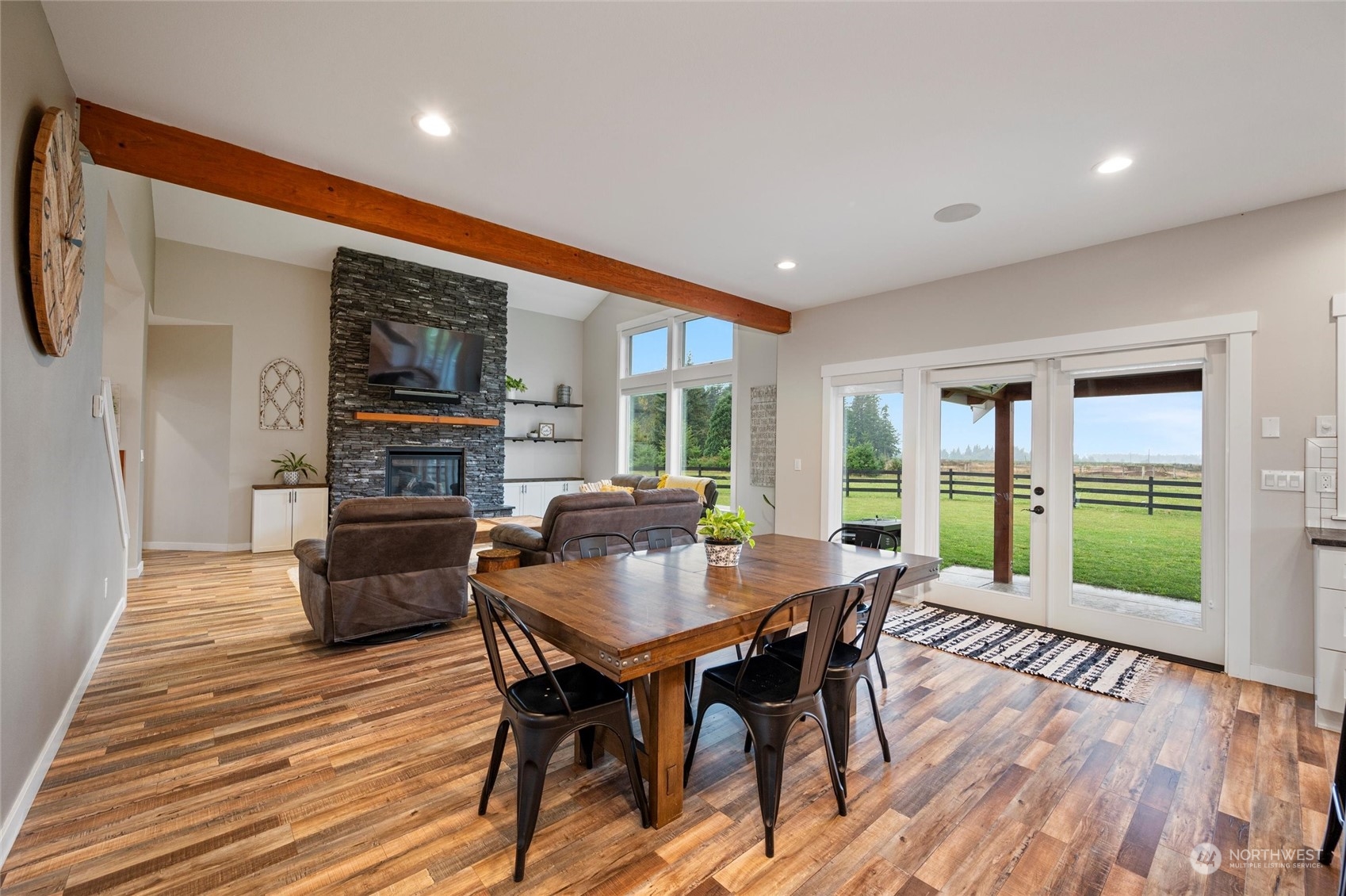 760 East Pole Road Lynden, WA 98264 - Photo 6 of 40 a view of a dining room with furniture window and wooden floor