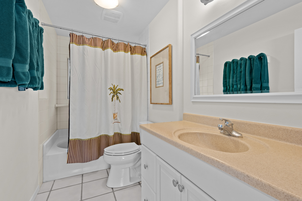 66-1685 Kohala Mountain Road Kamuela, HI 96743 - Photo 11 of 26 a bathroom with a sink toilet and shower