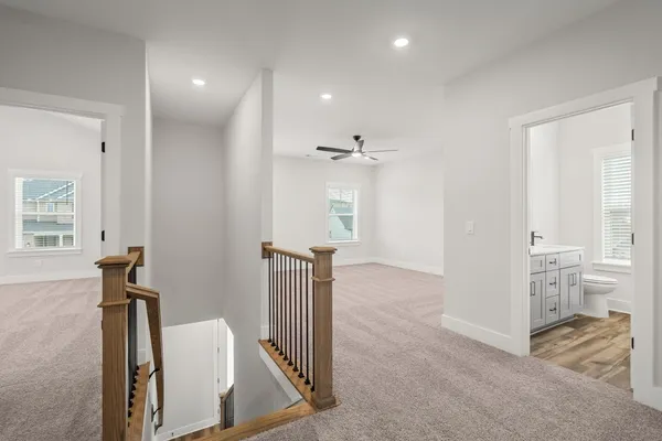 a view of a hallway with workspace