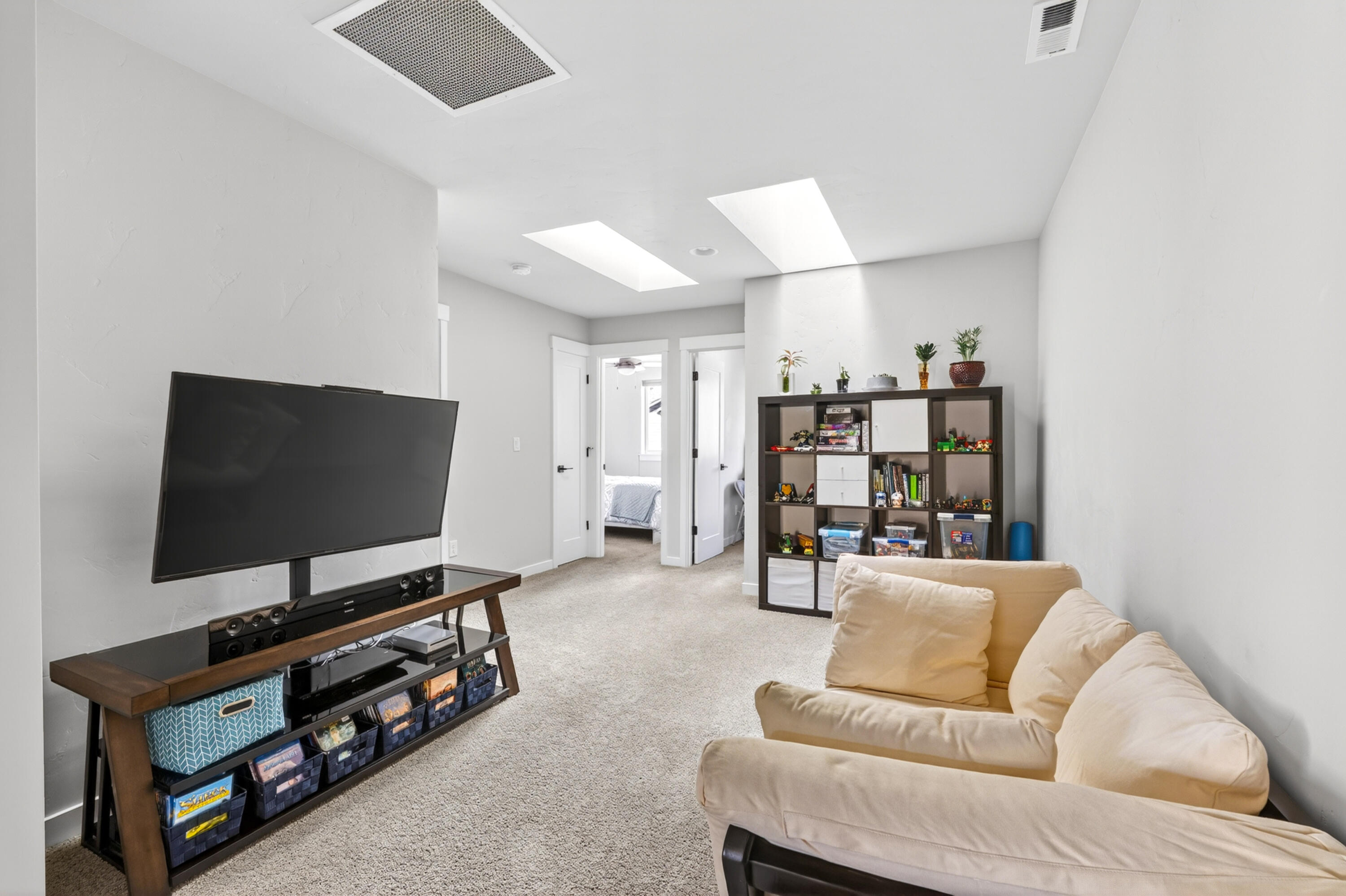 4572 Southwest 37th Street Redmond, OR 97756 - Photo 11 of 19 a living room with furniture and a flat screen tv