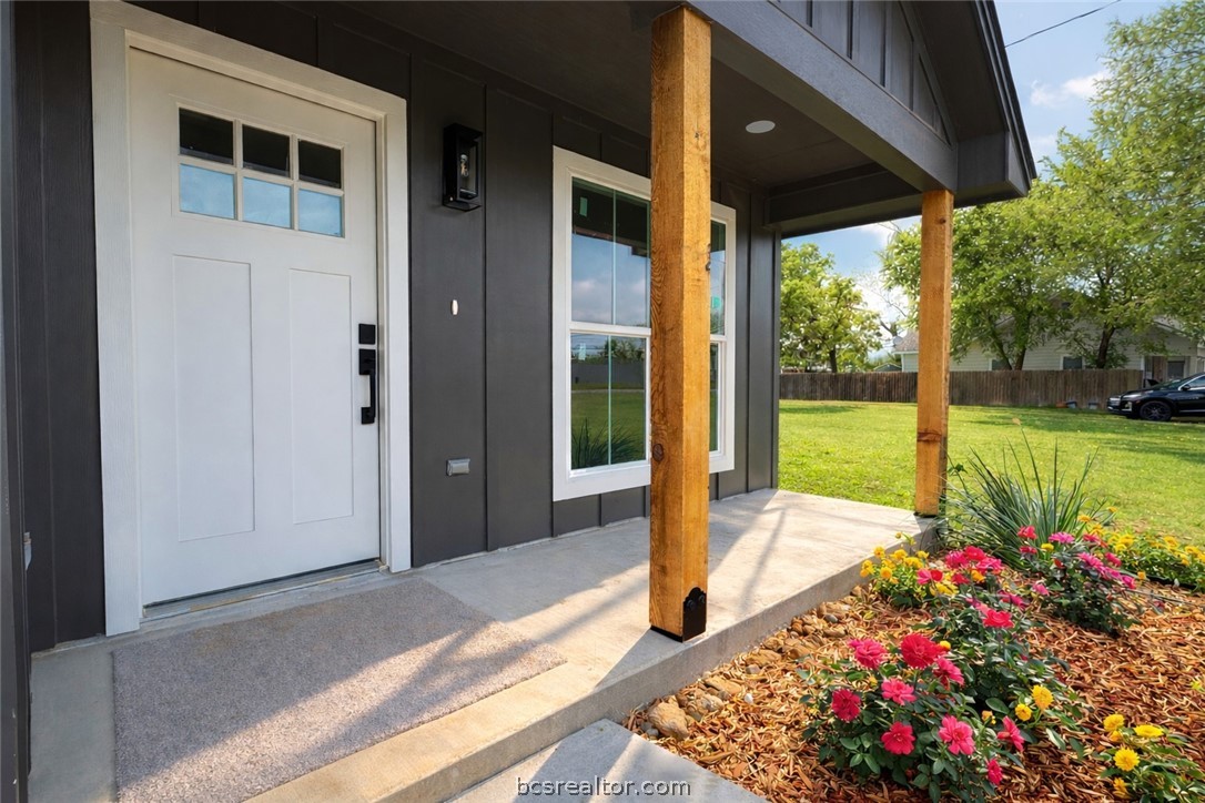 309 Wheelock Street Franklin, TX 77856 - Photo 2 of 15 a front view of a house with a porch