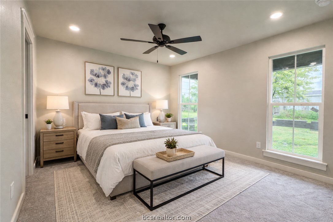 309 Wheelock Street Franklin, TX 77856 - Photo 8 of 15 a bed room with a bed and a window