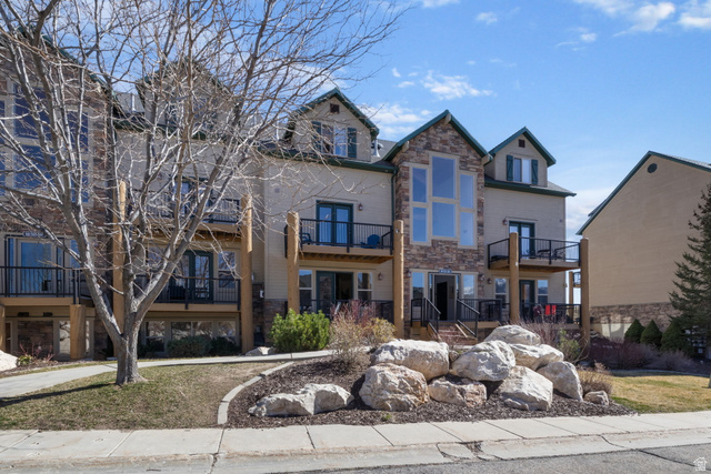 3598 North Huntsman Path, Unit 502 Eden, UT 84310 - Photo 40 of 43 View of front of property with stone siding