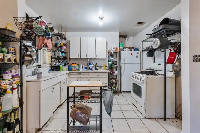 a bed room with a bed and a window