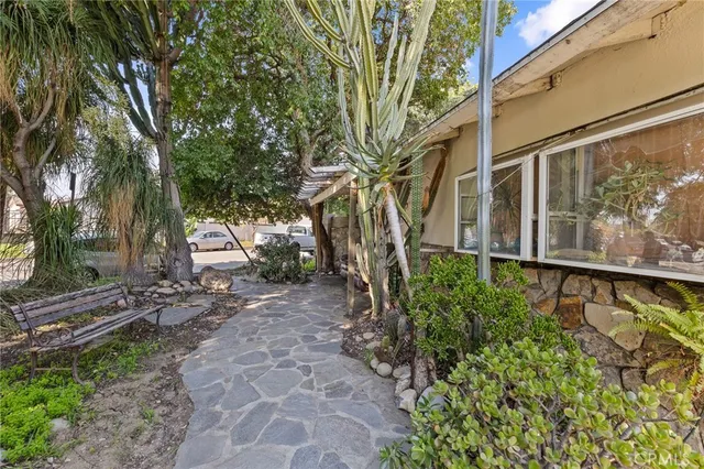 a backyard of a house with lots of green space