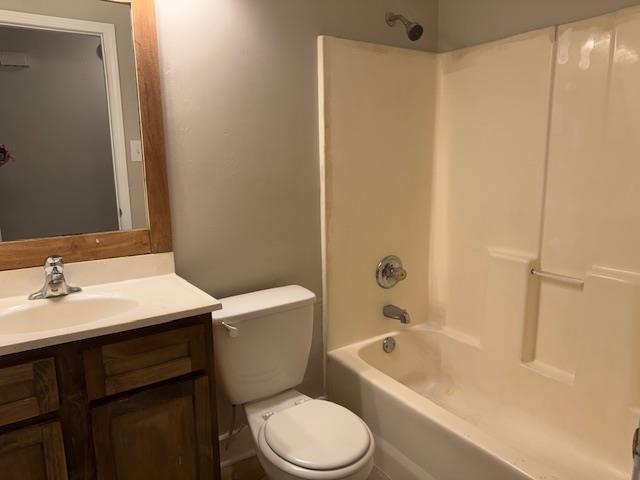 1315 Florida Street Memphis, TN 38106 - Photo 11 of 14 a bathroom with a sink a toilet a mirror and shower