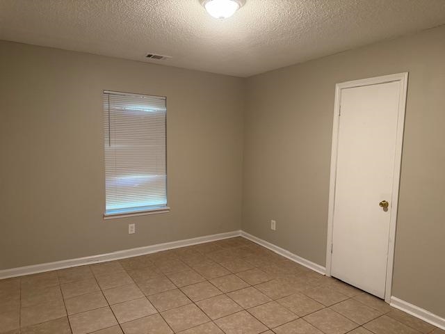 1315 Florida Street Memphis, TN 38106 - Photo 13 of 14 an empty room with windows