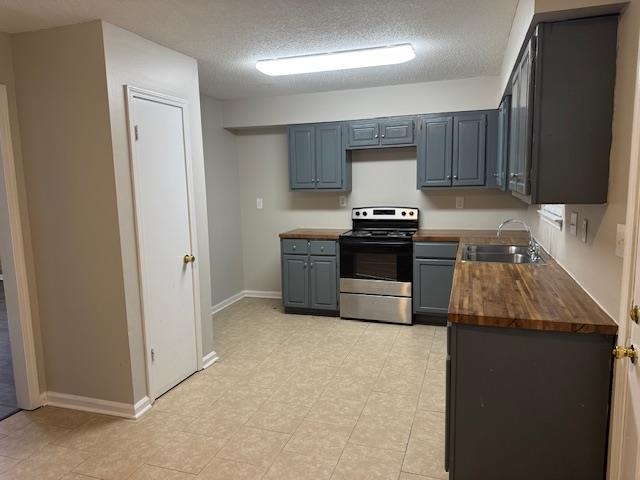 1315 Florida Street Memphis, TN 38106 - Photo 6 of 14 a kitchen with granite countertop a stove and a refrigerator