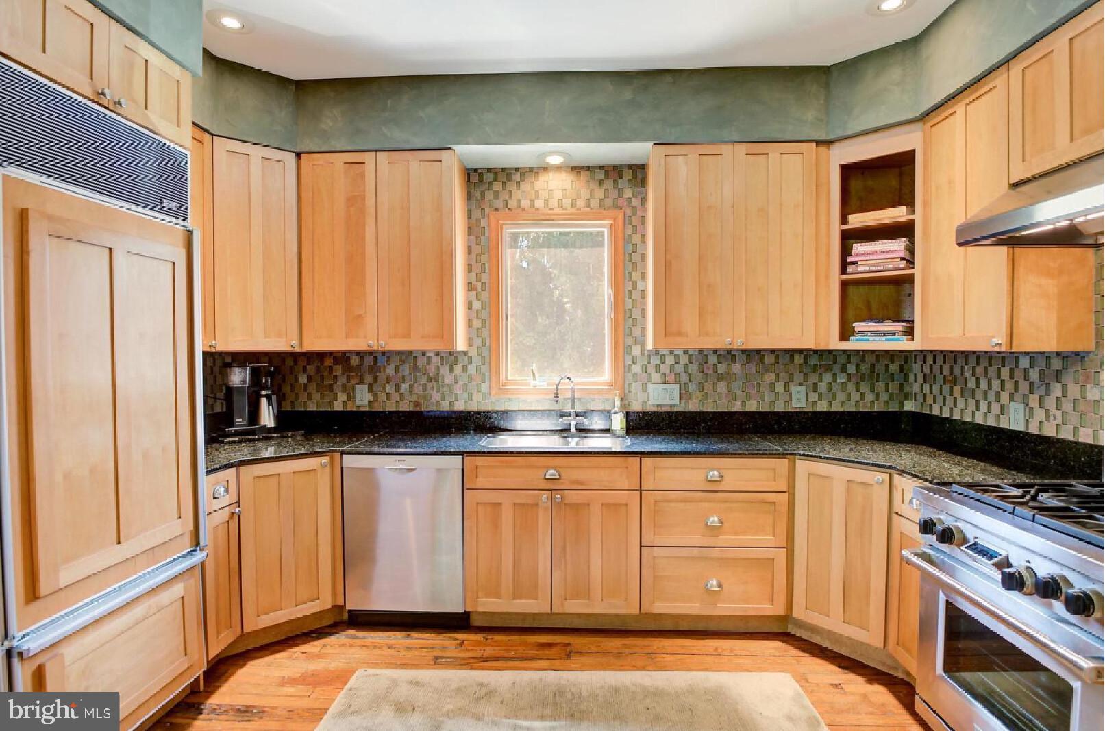 105-107 Franklin Road Glassboro, NJ 08028 - Photo 5 of 33 a kitchen with granite countertop a sink and a stove