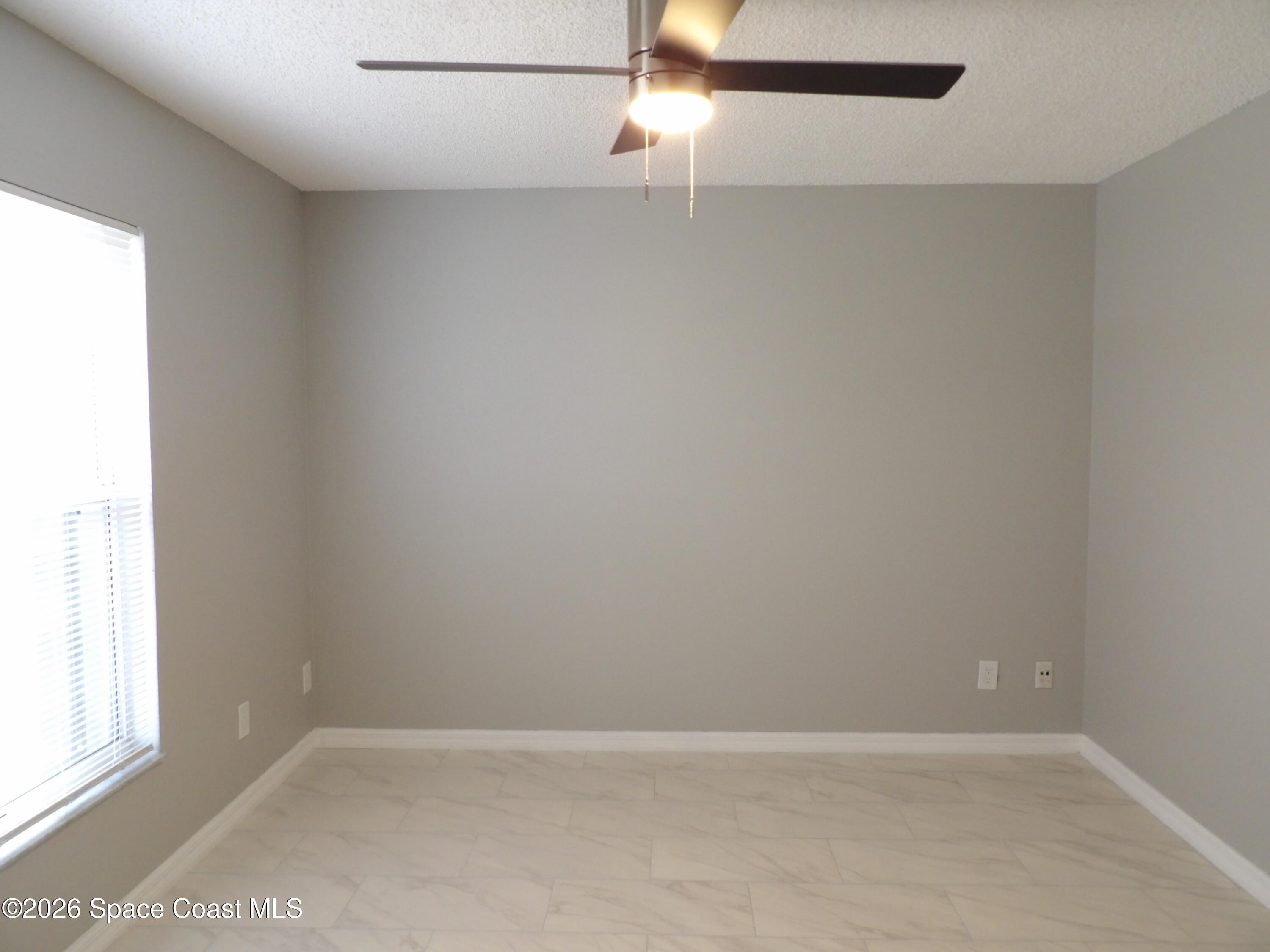 542 Octavius Road Southwest Palm Bay, FL 32908 - Photo 17 of 33 a view of an empty room