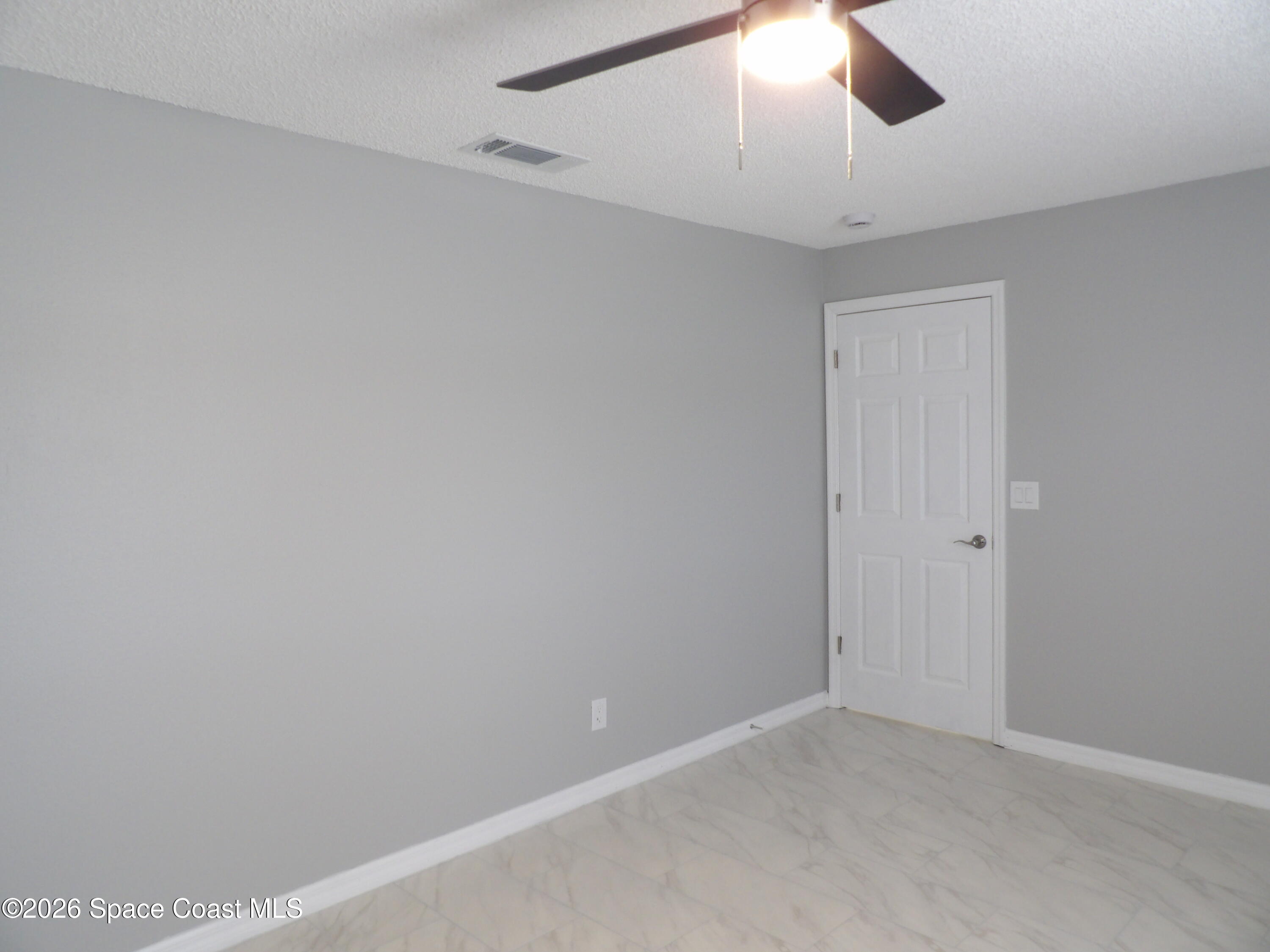 542 Octavius Road Southwest Palm Bay, FL 32908 - Photo 18 of 33 a view of an empty room