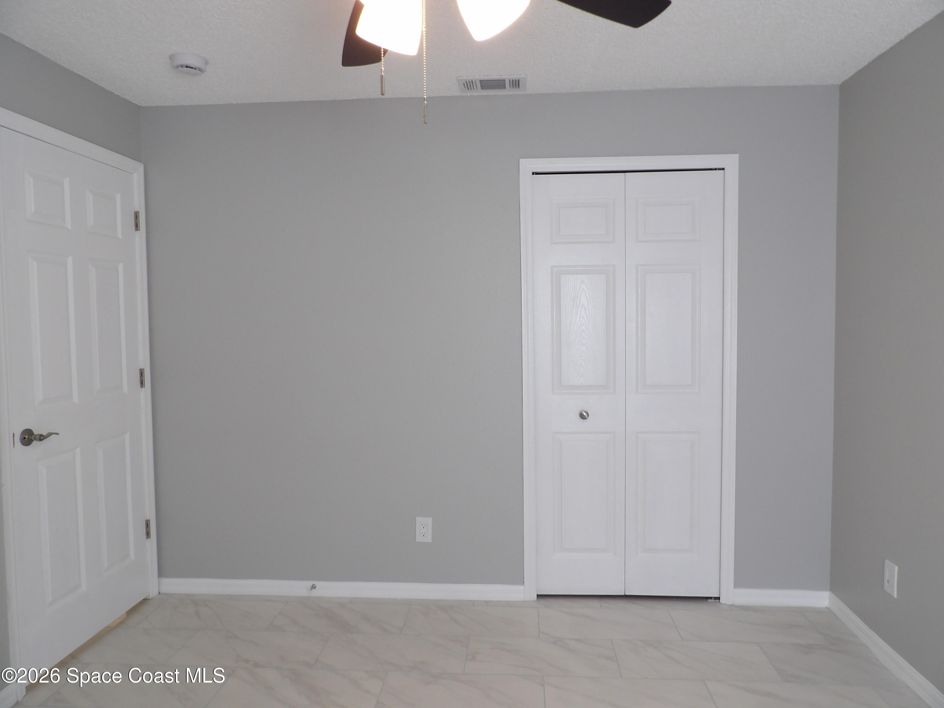 542 Octavius Road Southwest Palm Bay, FL 32908 - Photo 20 of 33 a view of an empty room