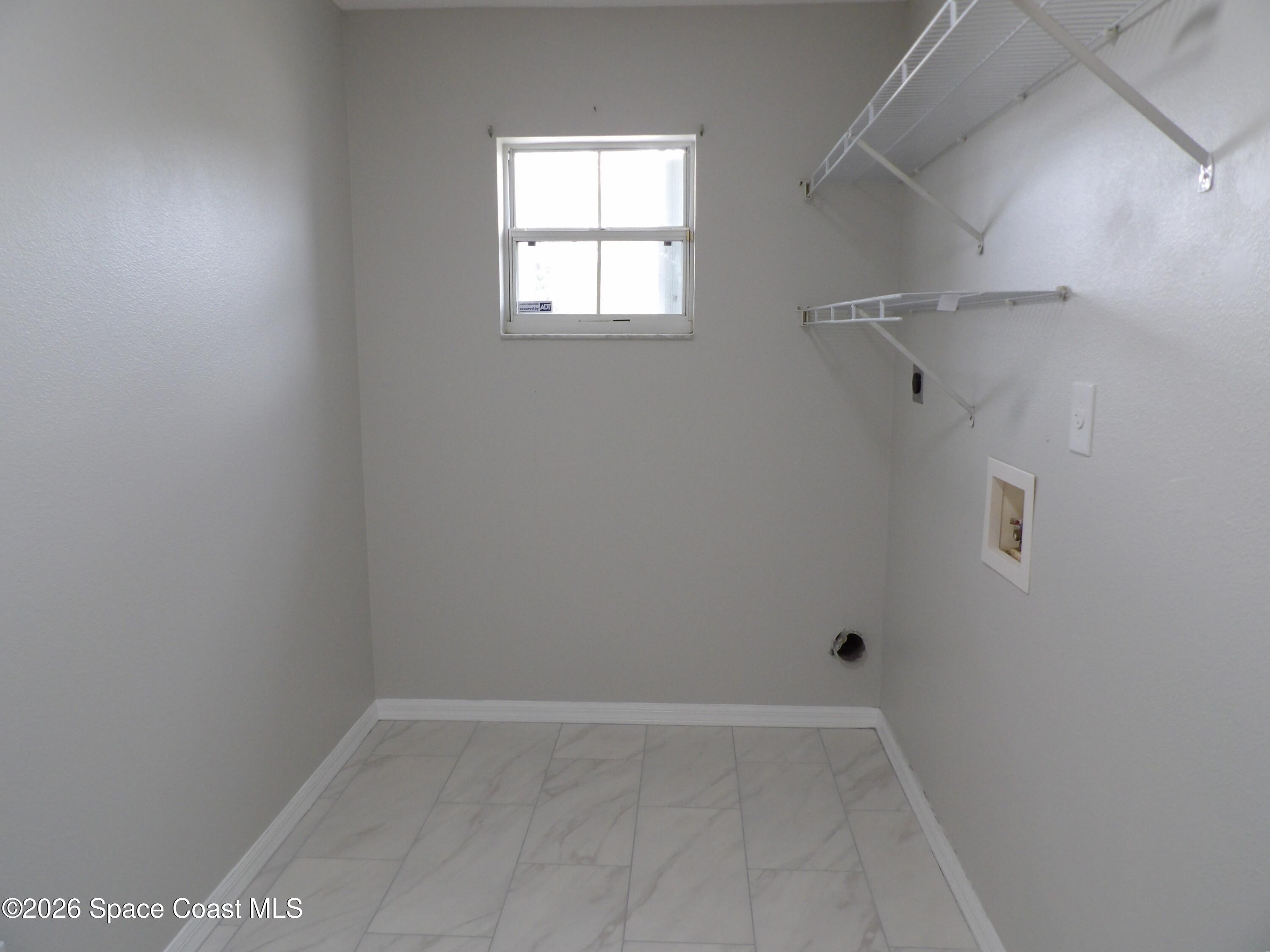 542 Octavius Road Southwest Palm Bay, FL 32908 - Photo 28 of 33 a view of an empty room
