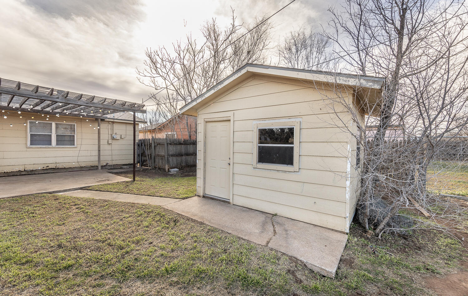 5308 23rd Street Lubbock, TX 79407 - Photo 24 of 25 a view of a house with a yard