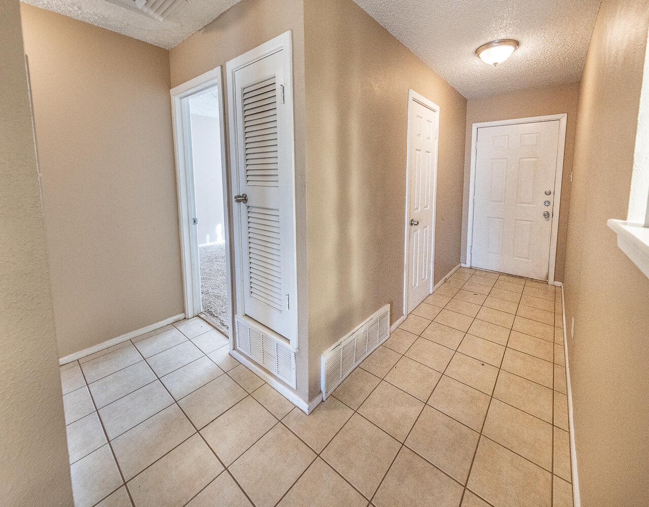 5308 23rd Street Lubbock, TX 79407 - Photo 5 of 25 an empty room with windows