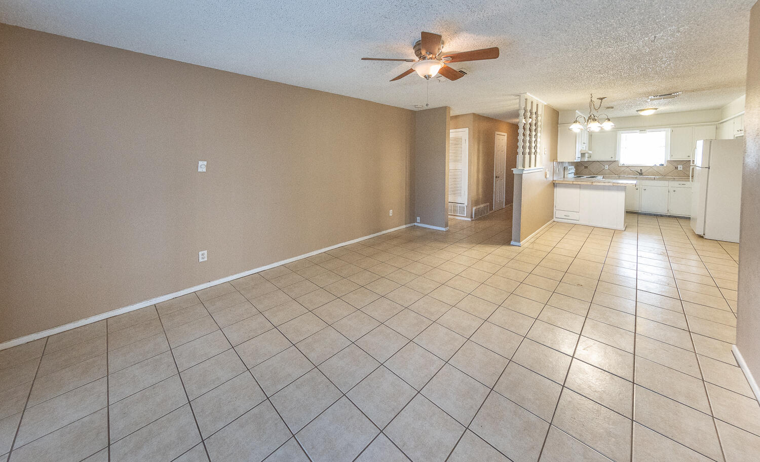 5308 23rd Street Lubbock, TX 79407 - Photo 8 of 25 a view of a kitchen with a sink and a window
