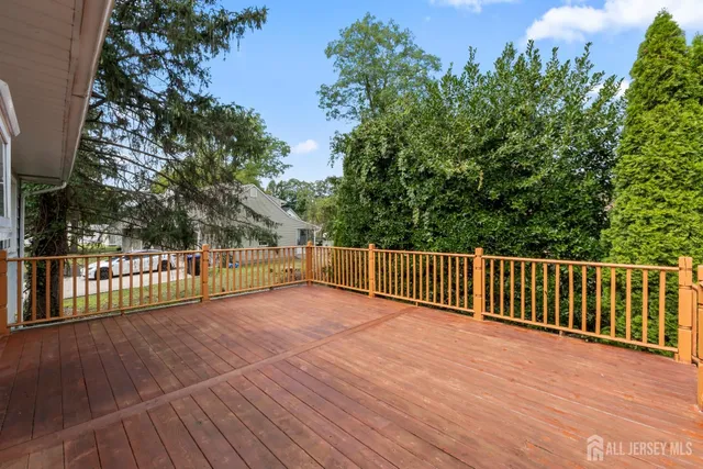 a view of balcony with wooden floor
