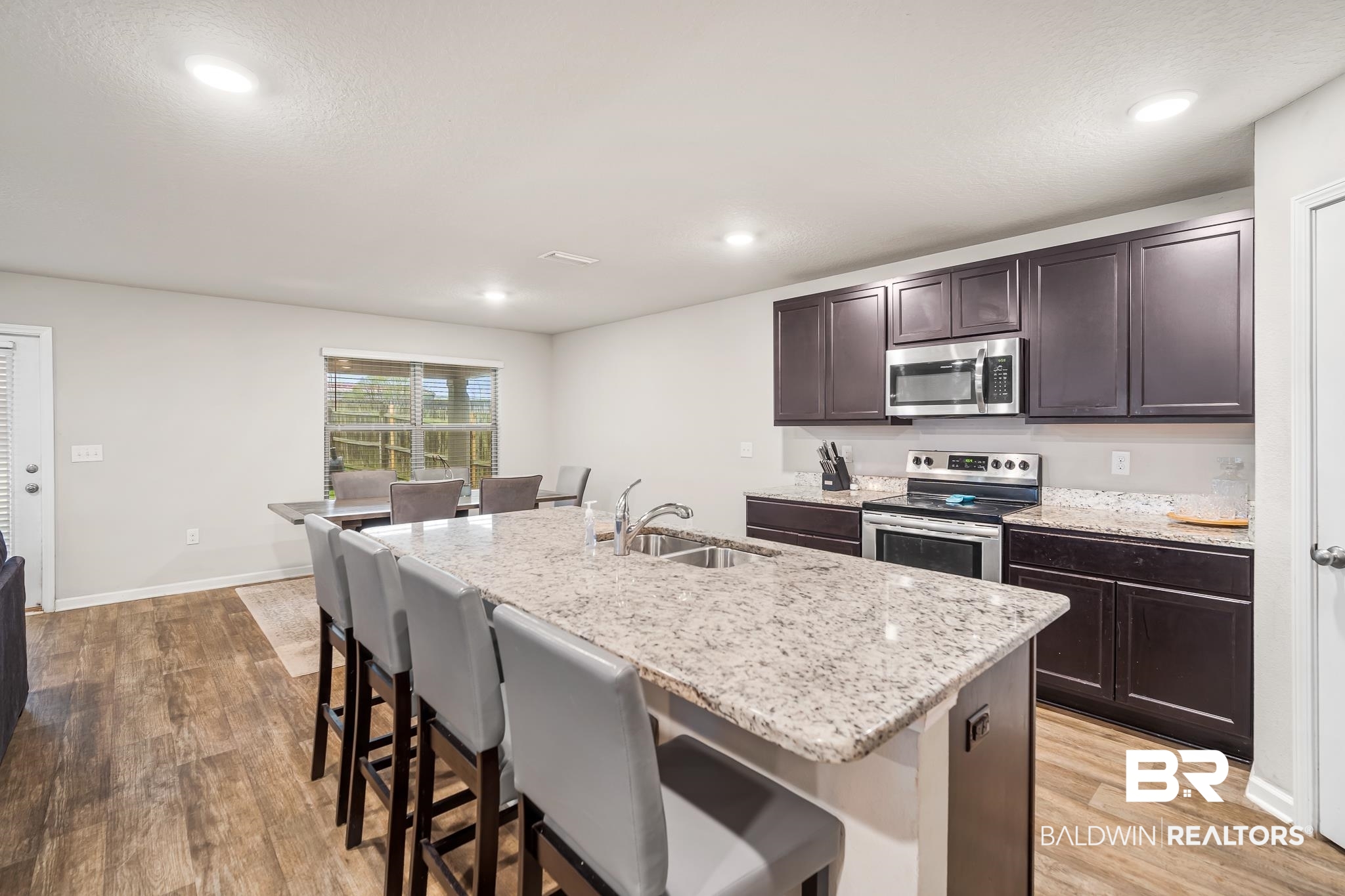 10074 Brodick Loop Daphne, AL 36527 - Photo 6 of 23 Center Island w/seating